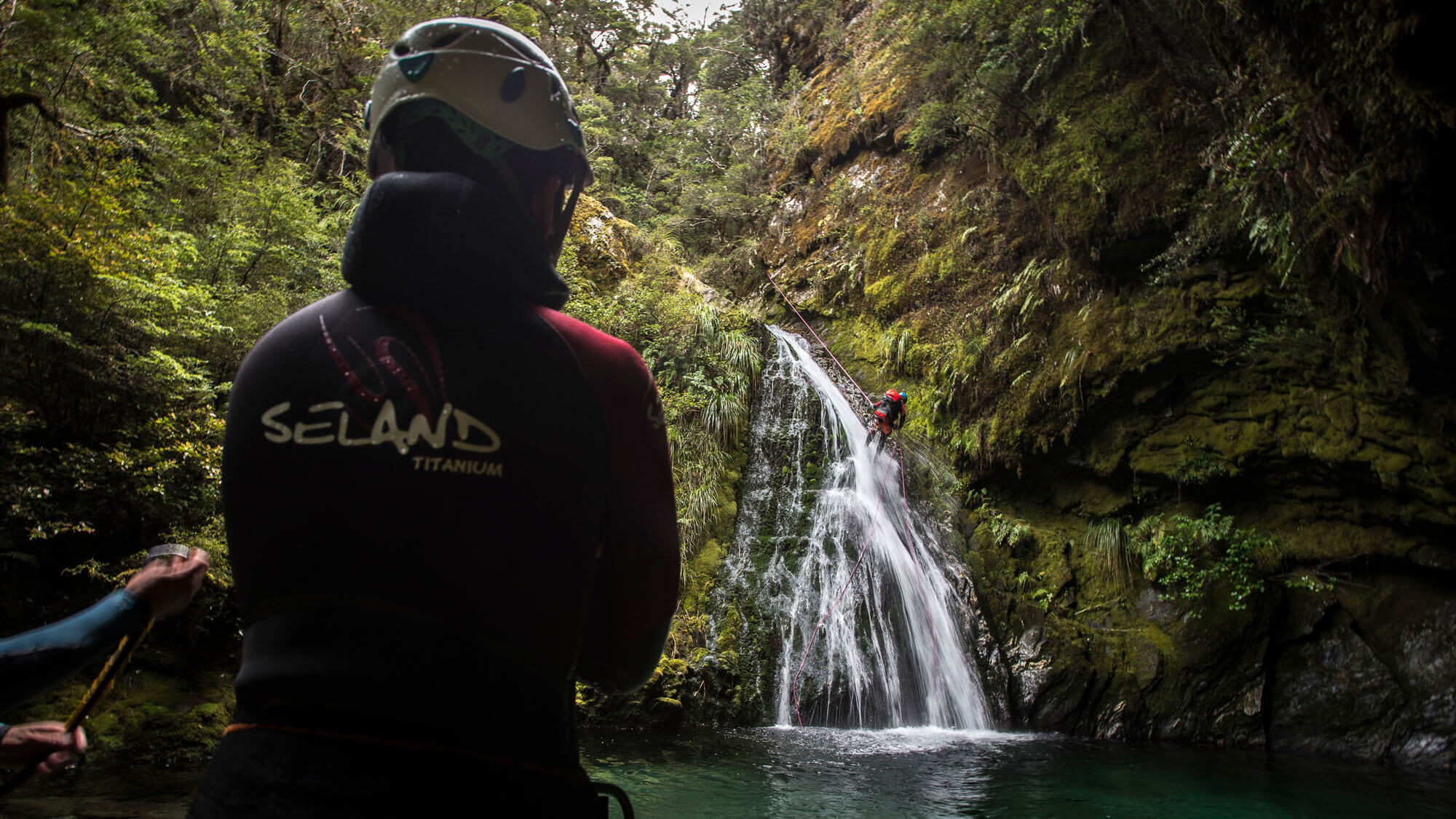 Canyoning or canyoneering in beautiful scenery in New Zealand