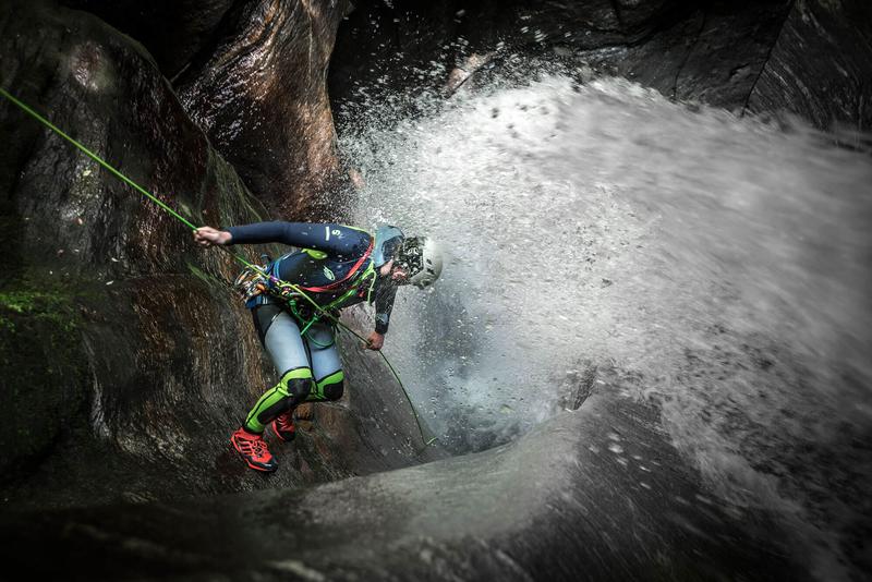 Rappelling in the canyon in New Zealand